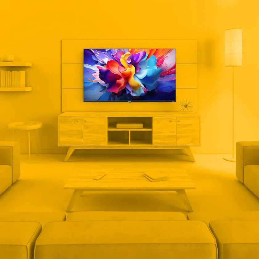 Element 55” 4K UHD HDR Frameless Xumo TV in monochrome yellow living room environment