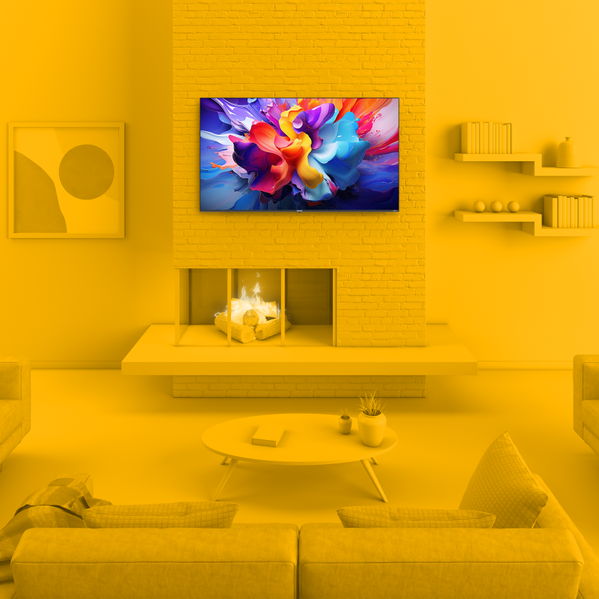 Element 75” 4K UHD HDR Frameless Xumo TV in monochrome yellow living room environment
