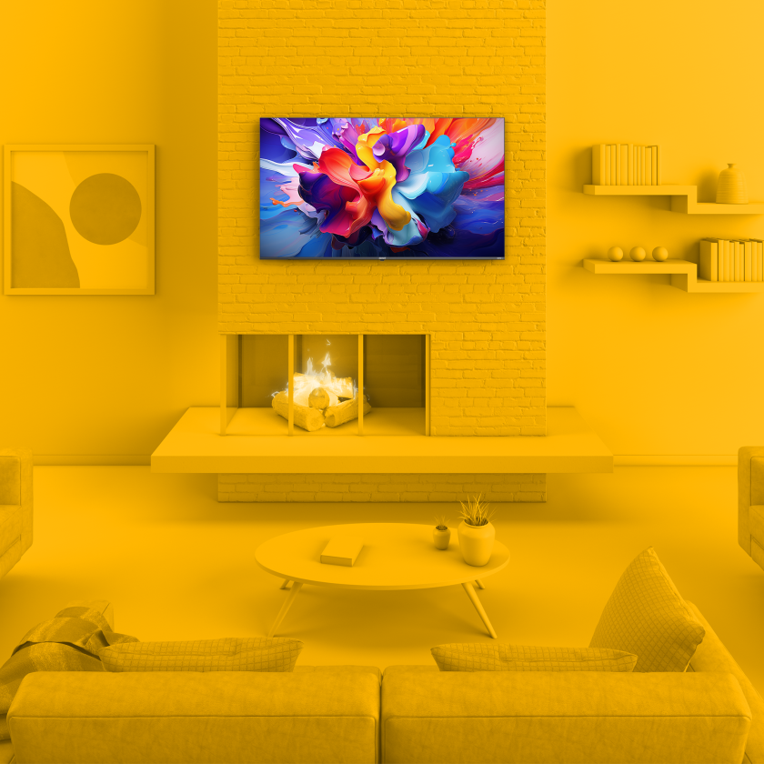 Element 75” 4K UHD HDR Frameless Xumo TV in monochrome yellow living room environment